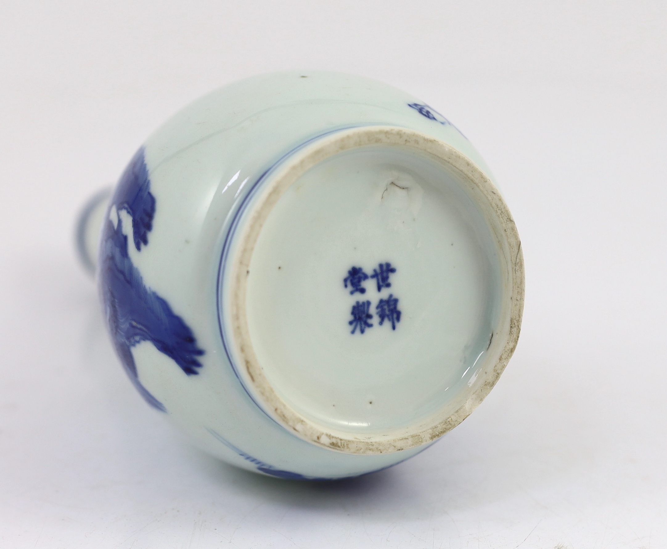 A Chinese blue and white ‘Zhong Kui’ inscribed bottle vase, early Kangxi period, hairline cracks to neck and inside edge of foot